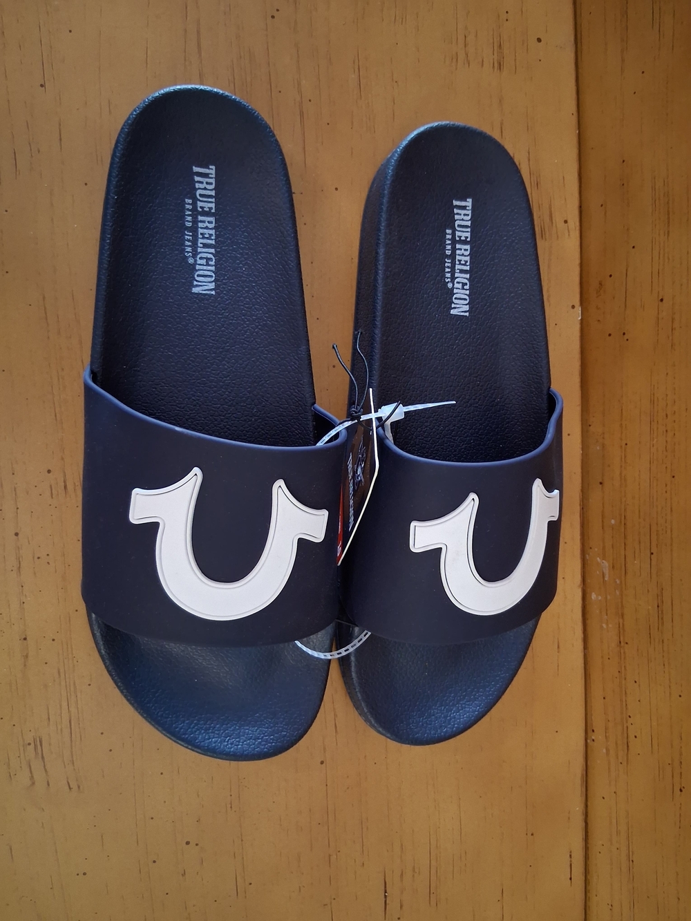 True Religion Black Slide Sandals with White Horseshoe Logo